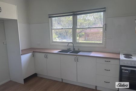 Rural home in the heart of town - Photo 5