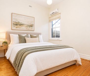 Three-Bedroom Home with Rear Courtyard and Storage - Photo 2