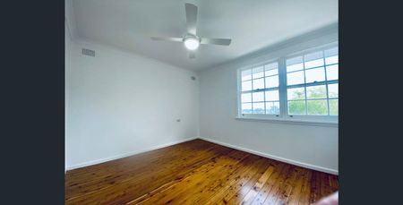 Elevated Living with Year-Round Comfort - Photo 2