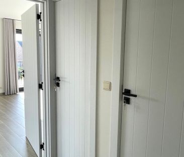 Gerenoveerd 2-kamerduplexappartement met overdekte autostaanplaats - Photo 2