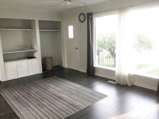 SPECIAL OFFER BEFORE JAN 15! TWO BDRMS MAINFLOOR FOR RENT IN RADISSON HEIGHTS! - Photo 1