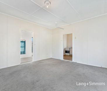 Spacious three-bedroom home on large block - Photo 1