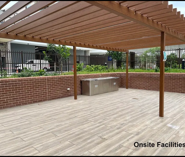 Modern 2-Bed Apartment in the Heart of Rouse Hill - Photo 2