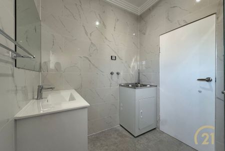 Updated 4 Bedroom Family Home, in a Prime Location! - Photo 2