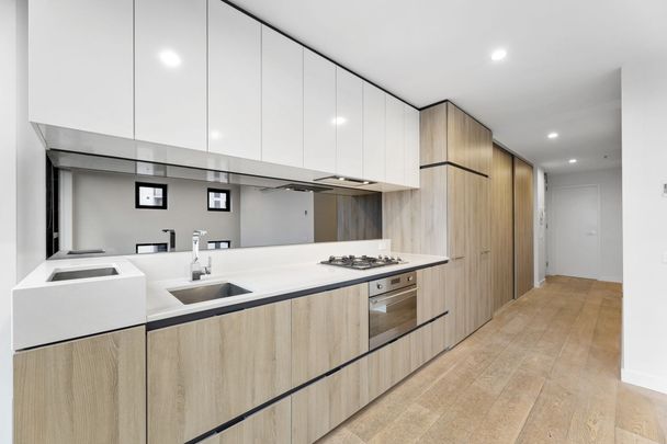 Freshly painted Two Bedroom Apartment on level 23 - Photo 1