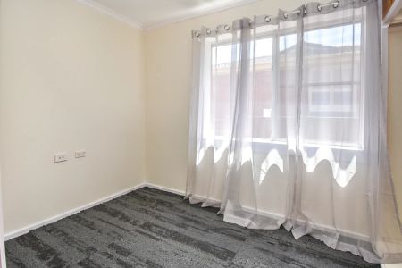 Three-Bedroom Home with Secure Yard - Photo 4