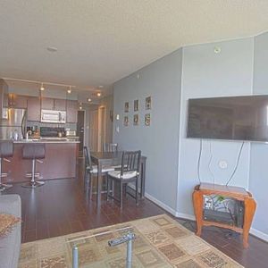 Sub-Penthouse at Electric Avenue. 1 Bdrm + 1 Bth + Den - UNFURNISHED - Photo 2