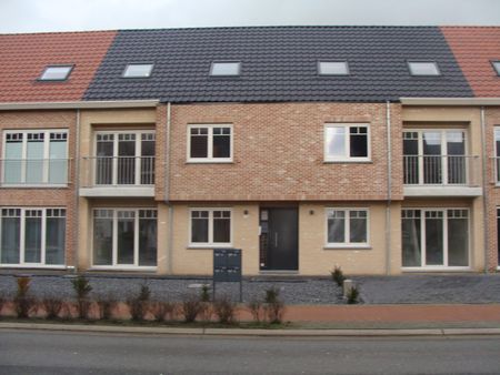 Gelijkvloers appartement (2 slpkr) met tuin en 2 autostaanplaatsen - Photo 4