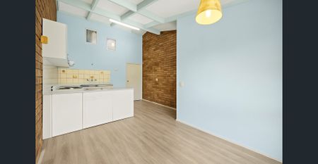 Two Bedroom Unit in Convenient Location - Photo 5