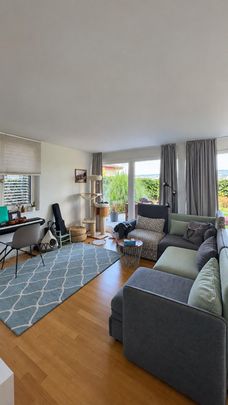 Charmante Wohnung mit Gartensitzplatz - Foto 1