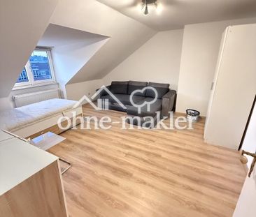 Helle renovierte 1-Zimmer-DG-Wohnung inkl. moderner separater Küche - Photo 2