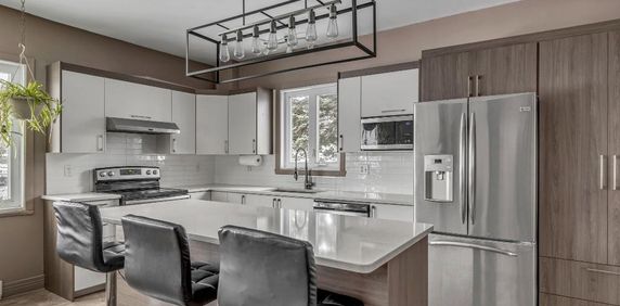 En face de l'université Laval - Photo 2