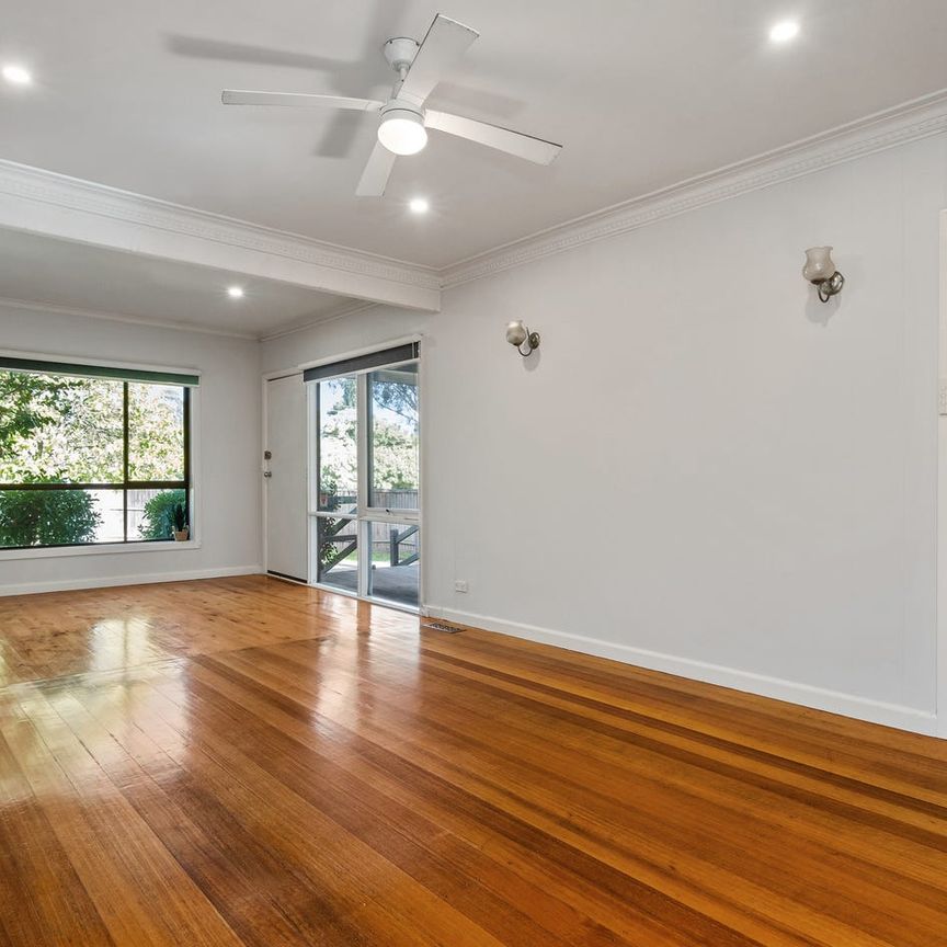 Spacious Four-Bedroom Home with a Generous Deck and Open-Plan Living - Photo 1