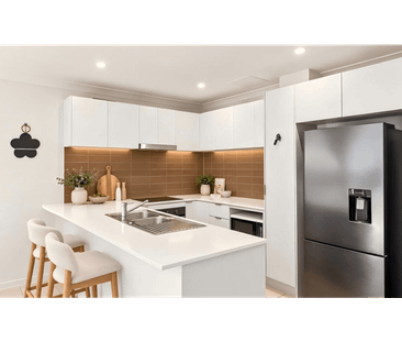 Spacious Four-Bedroom Townhouse with Family-Friendly Living & Excel... - Photo 4