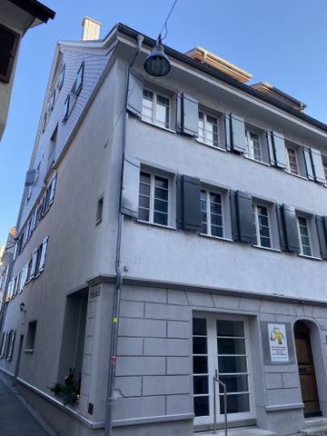 Charming living with cozy tiled stove - Photo 5