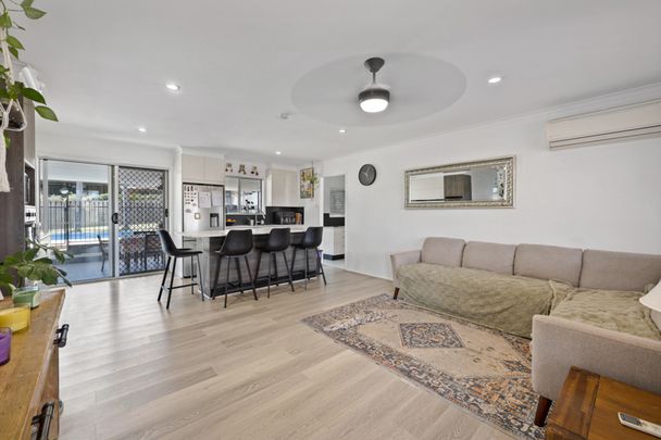 Brick home with huge entertainment area and pool - Photo 1