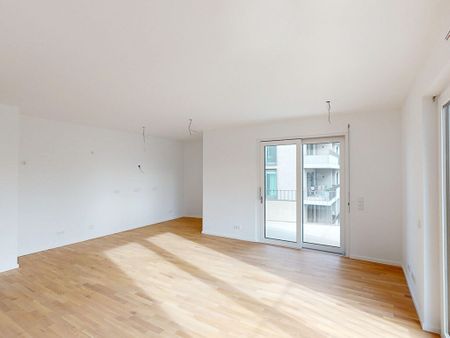 Neubau! 4-Zimmer-Wohnung mit Balkon und zwei Bädern (mietpreisgedämpft) - Photo 4