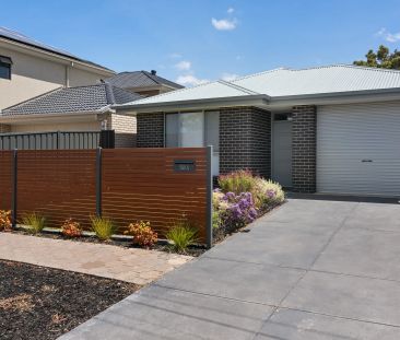 Modern Family Home with Solar, Secure Parking & Low-Maintenance Living - Photo 3
