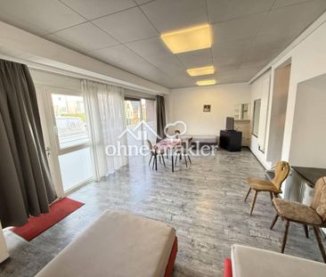 EG Wohnung mit großer Fensterfront und Terrasse - Foto 2