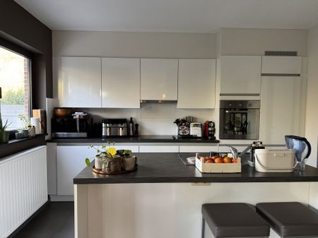 Ruim gelijkvloers 3 slpk appartement met terras en zicht op groen in hartje Bornem - Foto 4