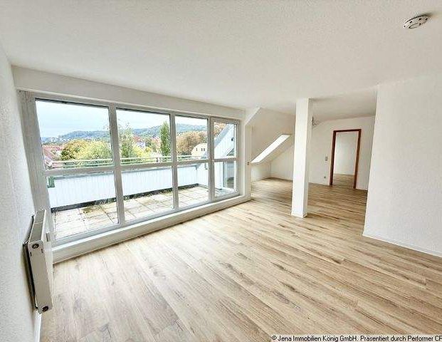 Renovierte Dachgeschosswohnung mit Loggia unweit vom Stadtzentrum entfernt - Foto 1