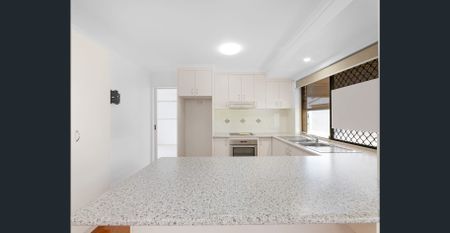 Well-Maintained 4-Bedroom Home - Photo 5