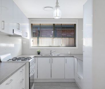 COMFORTABLE HOME INCLUDES SOLAR PANELS !!! - Photo 5