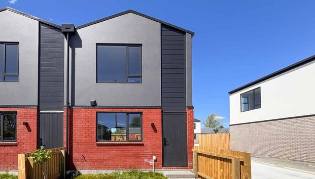 Fresh Build Two Bedroom Townhouse! - Photo 1