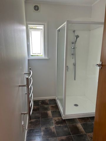 Charming 2BR Unit w/ Deck & lawn - Photo 3