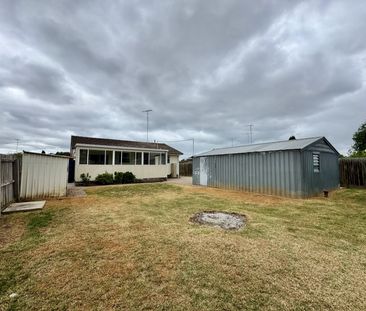 Updated Home with Spacious Yard and Prime Location - Photo 1