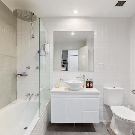 Split-Level Apartment in the Heart of Pacific Square - Photo 4