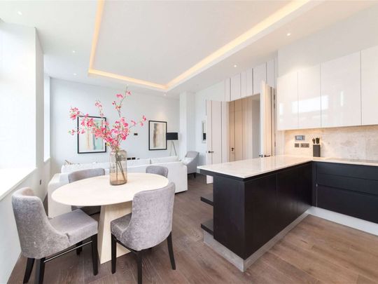 Immaculate 2 bedroom apartment situated on the 1st floor of this incredible modern development. Featuring high ceilings throughout, the apartment is well proportioned, modern and bright. - Photo 1