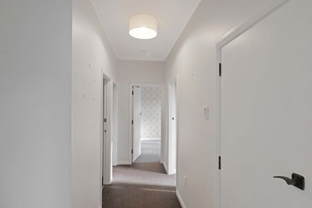 Sunny 3-Bedroom Home with Views in Island Bay - Photo 2