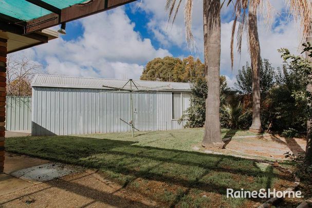 MODERN COMFORT IN A PRIME LAKE ALBERT LOCATION - Photo 1