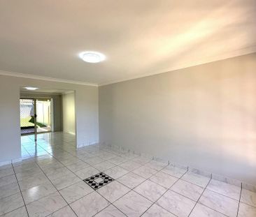 CONTEMPORARY DUPLEX IN HIGHLY DESIRED LOCATION - Photo 1