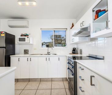 Elevated Beachside Living Generous Two-Bedroom Unit with Stunning O... - Photo 6