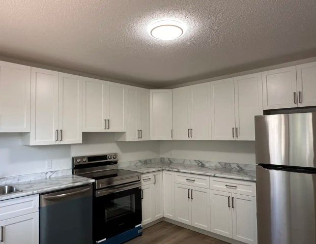 Inter-Struct Townhouses — 3 Bedroom 1 Bathroom - Photo 1