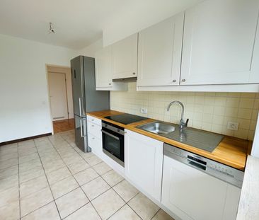 Ruim 2 slaapkamer appartement met kelder en autostaanplaats - Photo 3