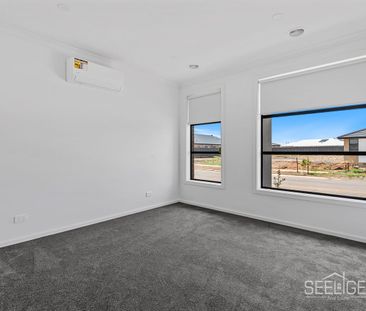 Brand New Family Home with Modern Comforts & Secure Living - Photo 1