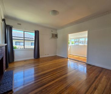 Freshly Painted Home in Ideal Location - Photo 2