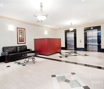 TASTEFULLY FURNISHED ONE BEDROOM APARTMENT IN THE ASTON | Furnished - Photo 1