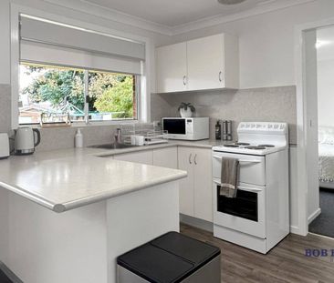 Two-Bedroom Duplex with Pool - Prime Location Near Orana Mall - Photo 6