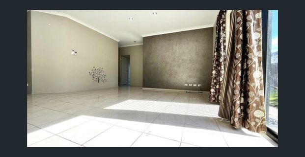 Spacious Four-Bedroom Family Home in a Convenient Epping Location - Photo 1