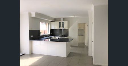 Modern three bedroom townhouse in a great location! - Photo 4