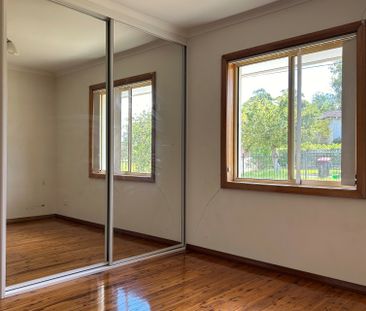 Neat & Tidy Family Home in Convenient Location - Photo 1