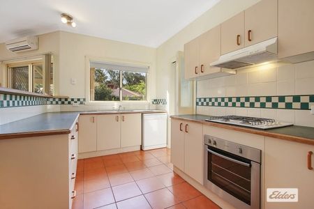 Charming 3-Bedroom Home with Lush Gardens - Photo 2