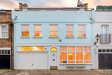 Well proportioned four / five bedroom Mews House enjoying a spacious reception, separate eat-in kitchen, three bathrooms, double garage and a sunny south facing terrace. - Photo 4