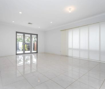 Modern, Low-Maintenance Living in a Prime North Lakes Location - Photo 1