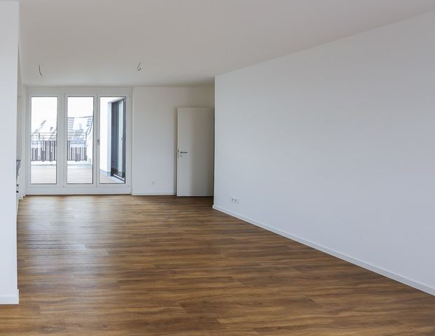 Dachgeschosswohnung mit großzügiger Terrasse - 3 Zimmer auf über 90 m² Wohnfläche - Foto 1