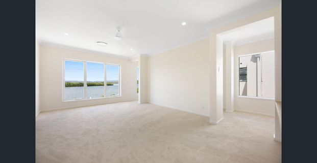 Brand New Waterside Luxury in the Exclusive Serenity Waters Estate - Photo 1